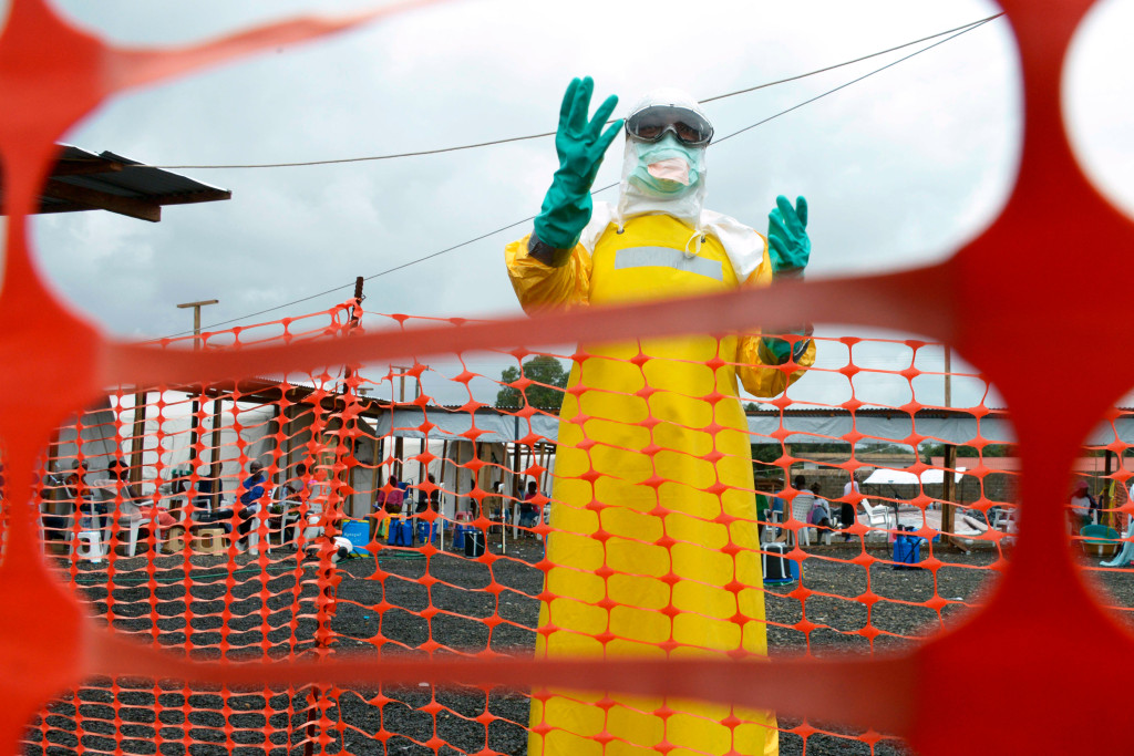 A health worker, wearing Personal Protective Equipment (PPE), stands inside the high-risk area at Elwa hospital in Monrovia,&hellip;